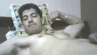 Indian guy cums while flexing muscles